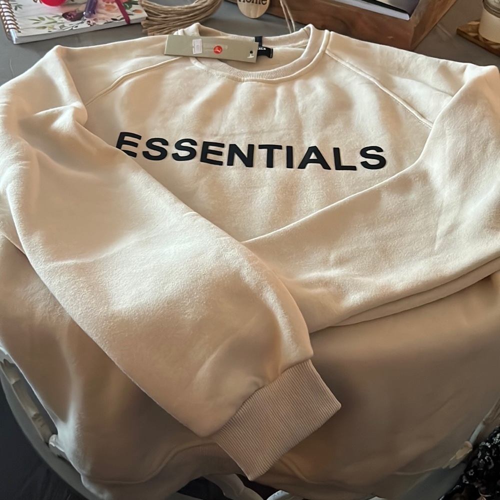 New with tags ESSENTIALS cream sweat shirt size large
